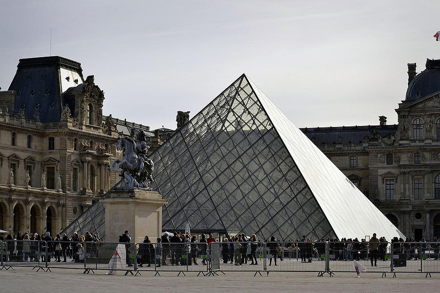 Louvre Pyramid and Palace Photograph by Nadalyn Larsen