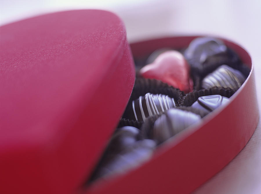 Love heart box of chocolates, close-up Photograph by Ryan McVay