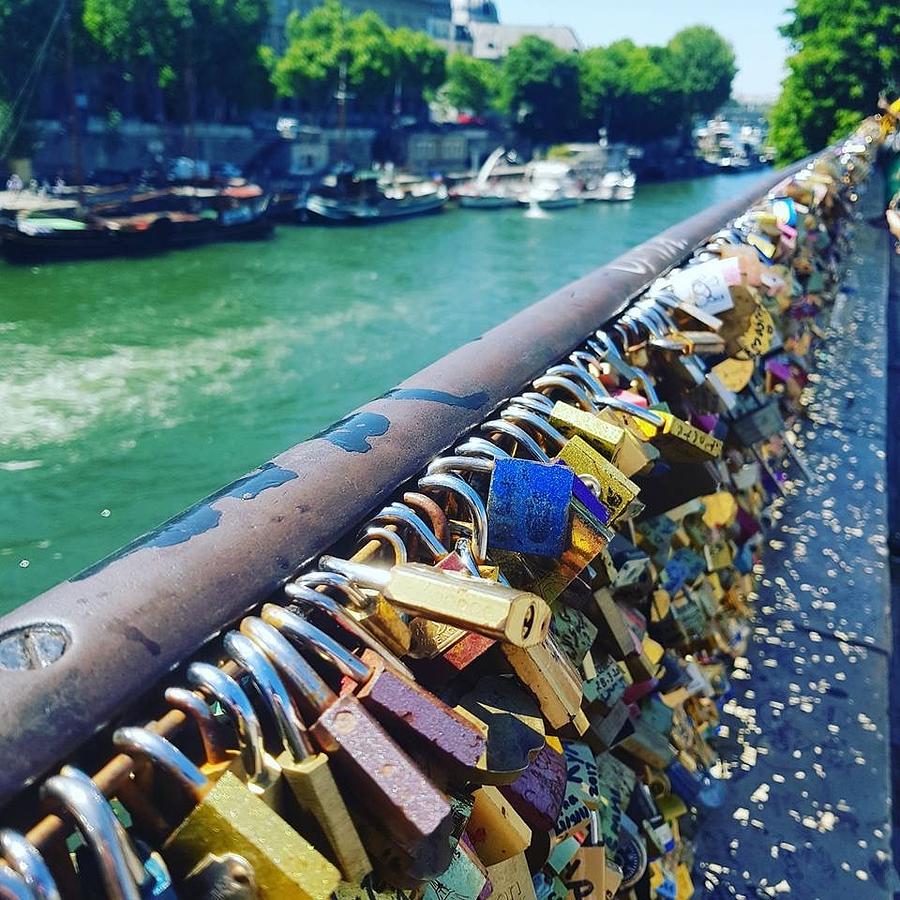 Love Locks Over the Seine River Photograph by Tim Mattox