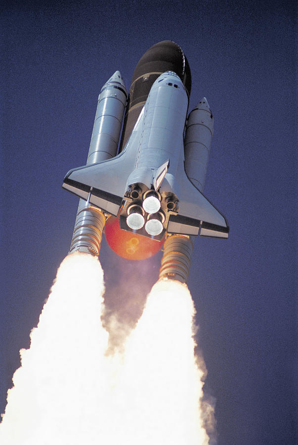 Low Angle View Of A Space Shuttle Taking Off Photograph by Stockbyte