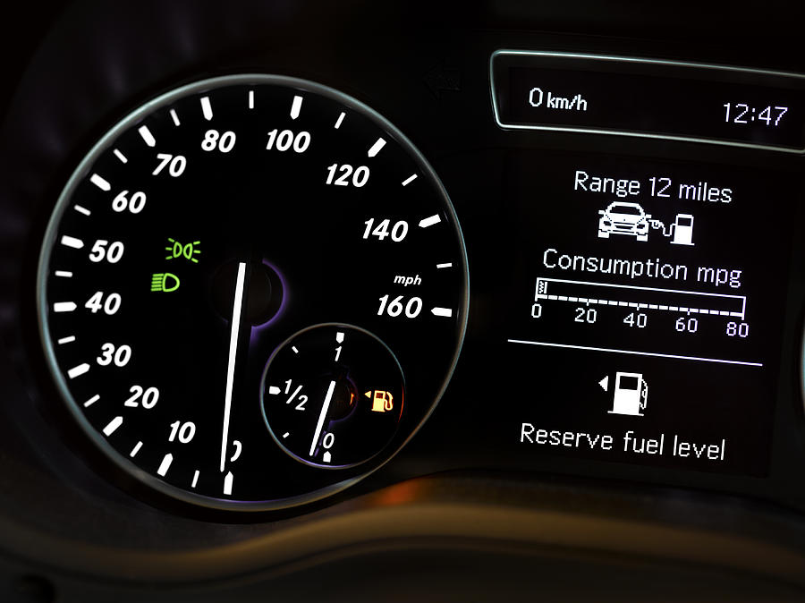 Low fuel gauge Photograph by Peter Dazeley Low fuel gauge Photograph by Peter Dazeley