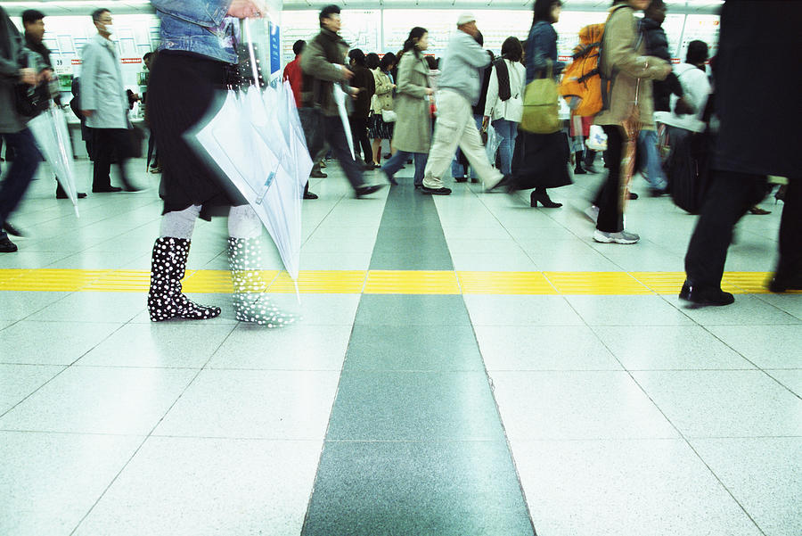 Low Section View of Walking Commuters, Shinjuku, Tokyo, Japan Photograph by Digital Vision.