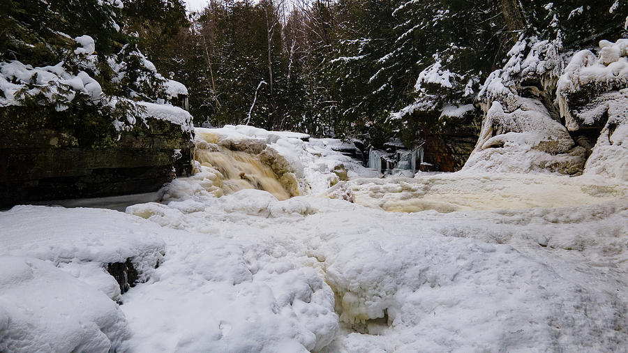 Low view of Canyon Falls in the winter in Michigan Photograph by Eldon McGraw