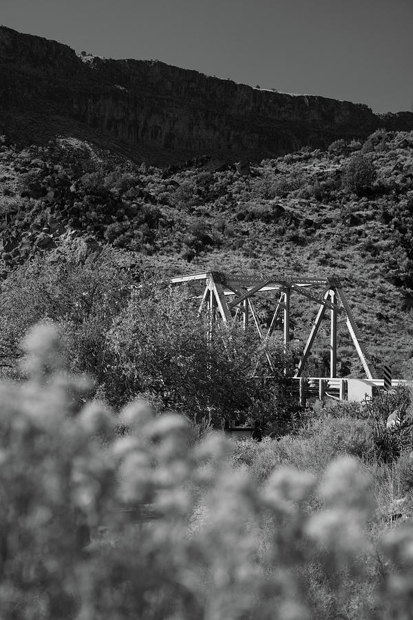 Lower Taos Canyon in New Mexico with bridge in black and white Photograph by Eldon McGraw