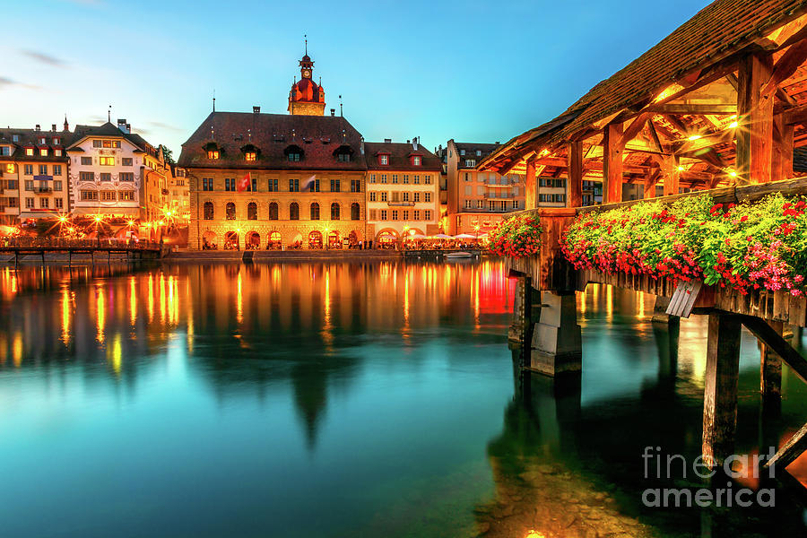 Lucerne flowery Chapel Bridge Photograph by Benny Marty