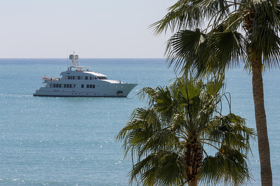 Luxury-yacht in Pissouri Bay on the island of Cyprus Photograph by Brand X Pictures