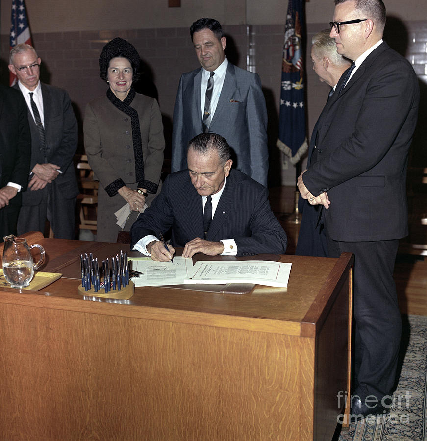 Lyndon Baines Johnson Signing Higher Education Act, 1965 Photograph by Frank Wolfe