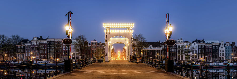 Magere Brug bridge at dusk Amstel River Amsterdam Netherlands Photograph by Sonny Ryse
