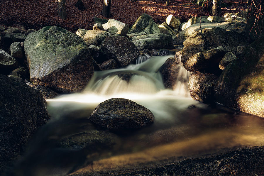 Liters Of Water Flow Through The Stones Photograph
