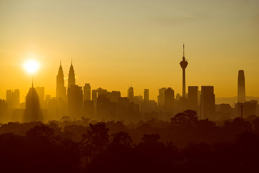 Majestic sunrise view over downtown Kuala Lumpur. Photograph by Shaifulzamri
