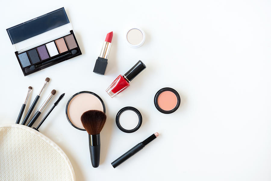 Makeup cosmetics tools background and beauty cosmetics, products and facial cosmetics package lipstick, eye shadow on the white background. Lifestyle Fashion Concept Photograph by Wand_Prapan