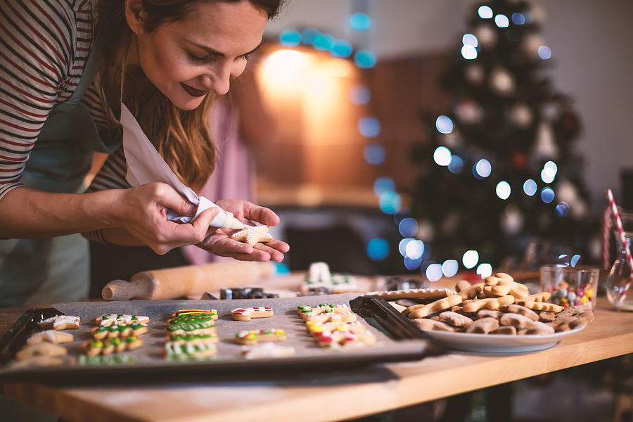 Making Gingerbread cookies for Christmas Photograph by MilosStankovic