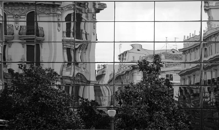Malaga in a mirror Photograph by Jolly Van der Velden