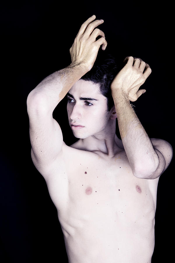 Male ballet dancer with gold painted hands and arm Photograph by By Wunderfool