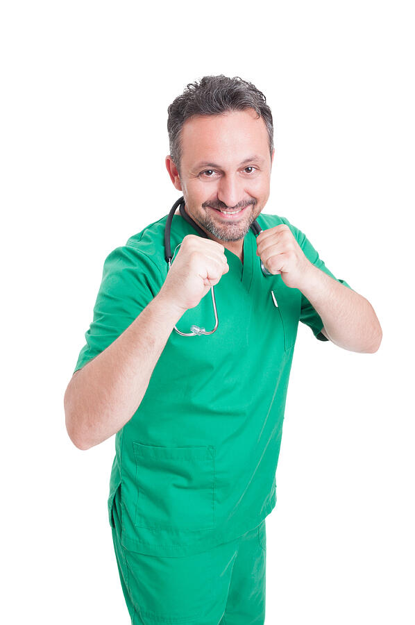 Male doctor in fighting position Photograph by Catalin205