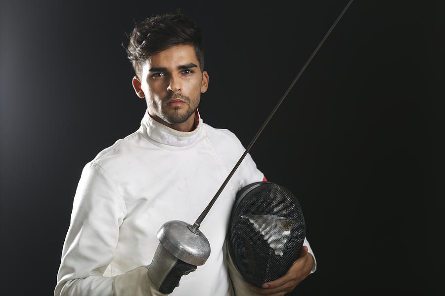 Male fencer Photograph by GoodLifeStudio