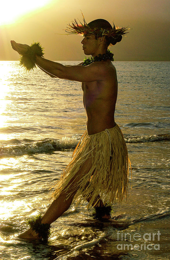 Male Hula Dancer in offering pose into the sunset. Photograph by ...