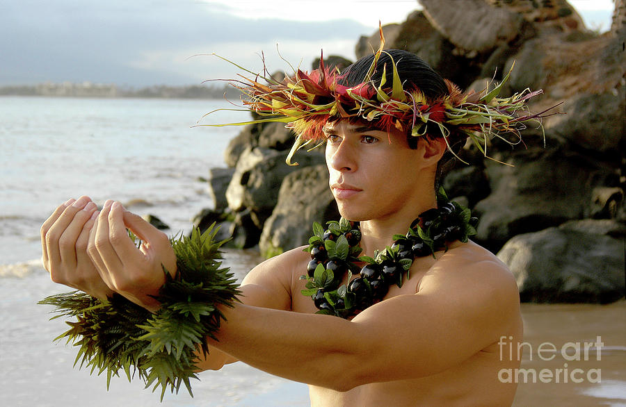 Male Hula Dancer poses with hands reaching out Photograph by Gunther Allen