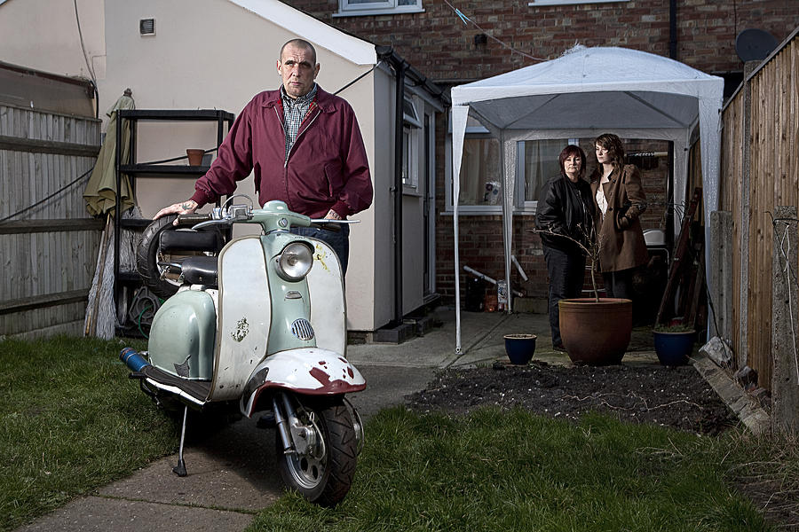 Male skinhead with scooter and family Photograph by Jamie Garbutt