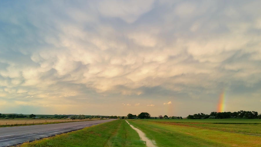 Mammatus and a Rainbow  Photograph by Ally White