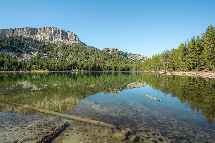 Mammoth Crest reflecting in McCloud Lake Photograph by Alexander Kunz