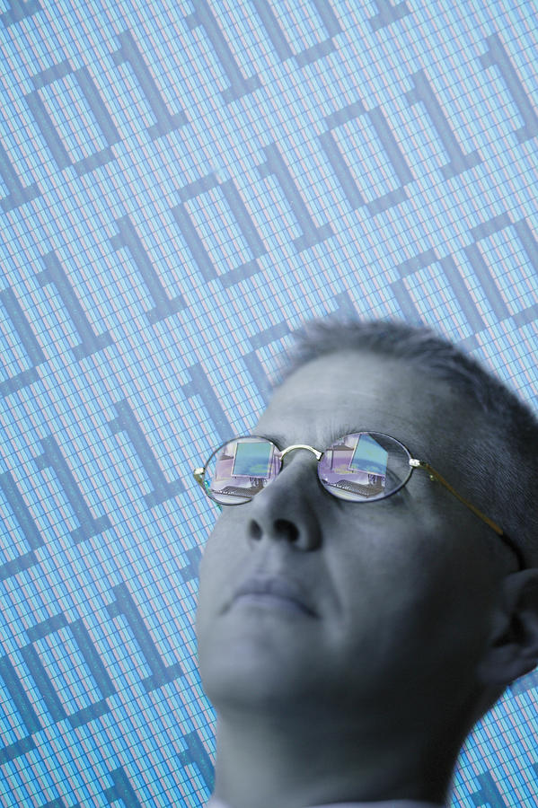 Man and binary code Photograph by Comstock