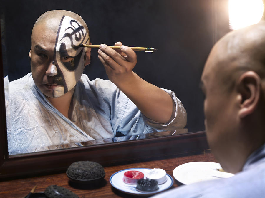 Man applying makeup for Chinese Opera Photograph by K-King Photography Media Co. Ltd