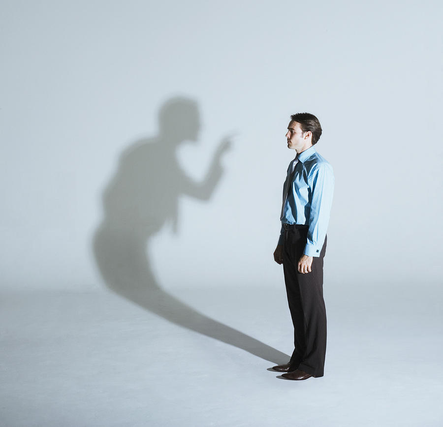 Man being scolded by his shadow Photograph by Martin Barraud