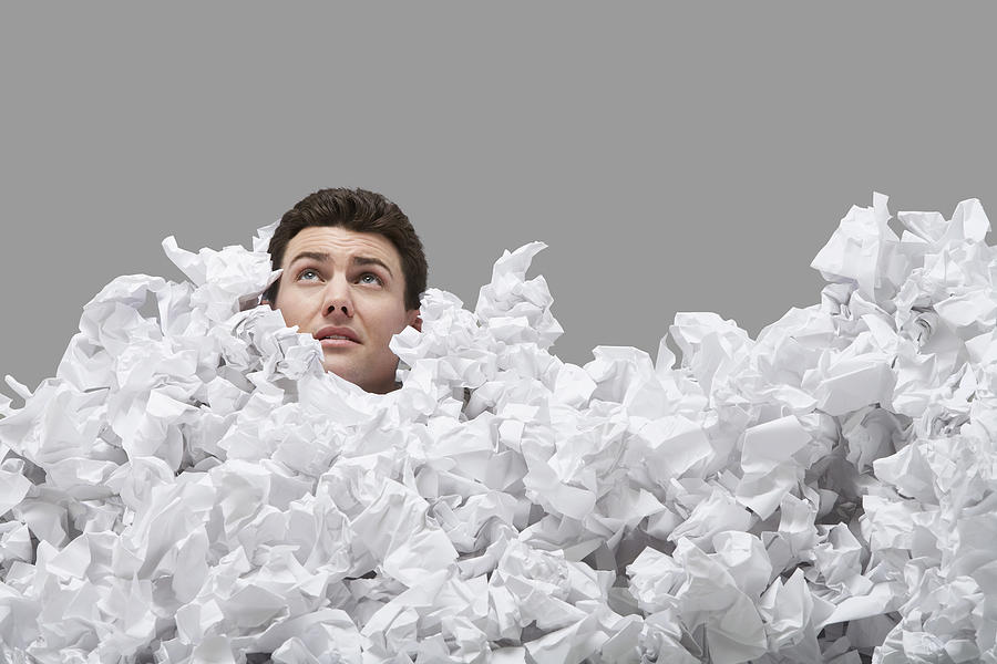 Man Buried in Crumpled Paper Photograph by Moodboard