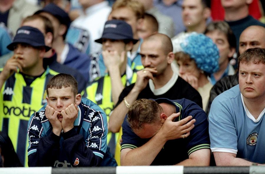Man city fans Photograph by Alex Livesey