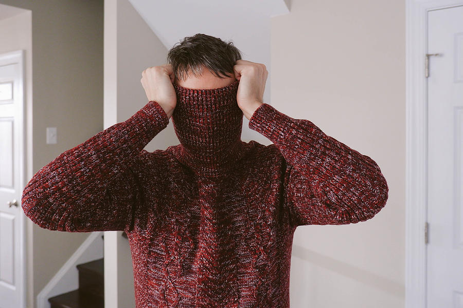 Man Covers Face With Sweater Photograph by Grace Cary
