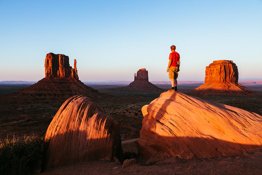 Man enjoying sunset over Monument Valley, USA Photograph by Matteo Colombo