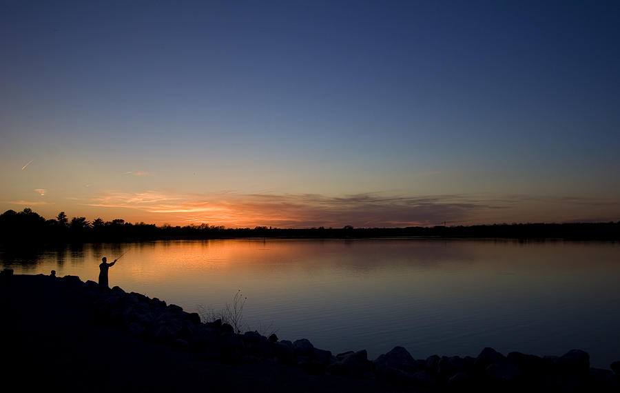 Man Fishing at Sunset Photograph by Ryan McGinnis