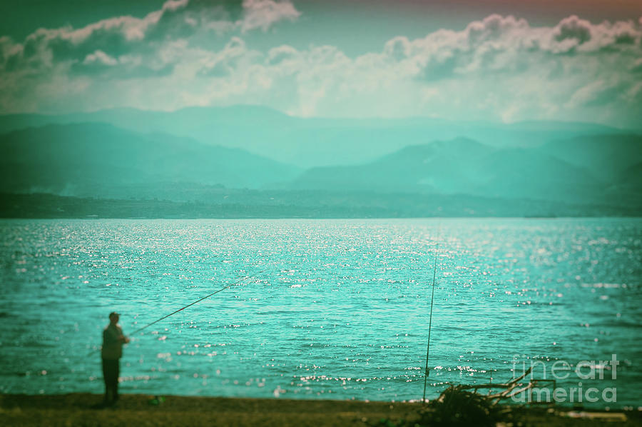Man fishing on Messina Strait Photograph by Silvia Ganora