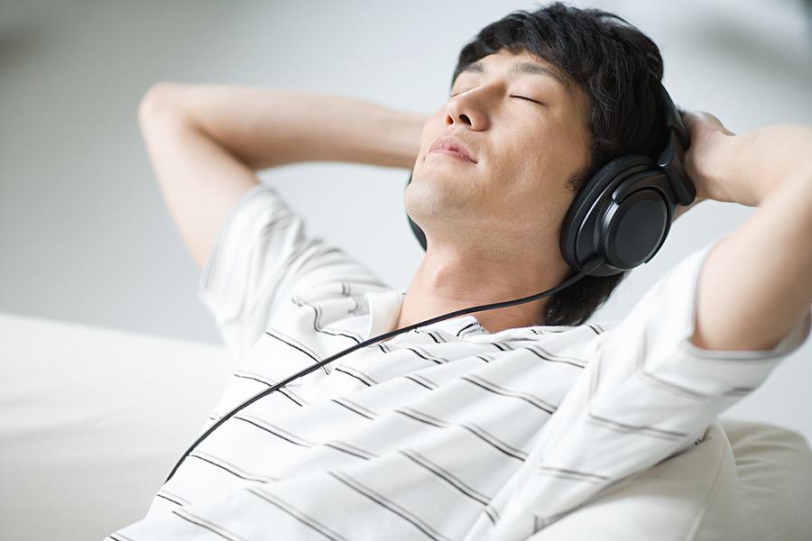 Man listening to music Photograph by Image Source