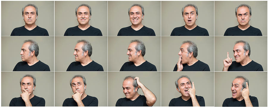 Man making facial expressions Photograph by Herkisi