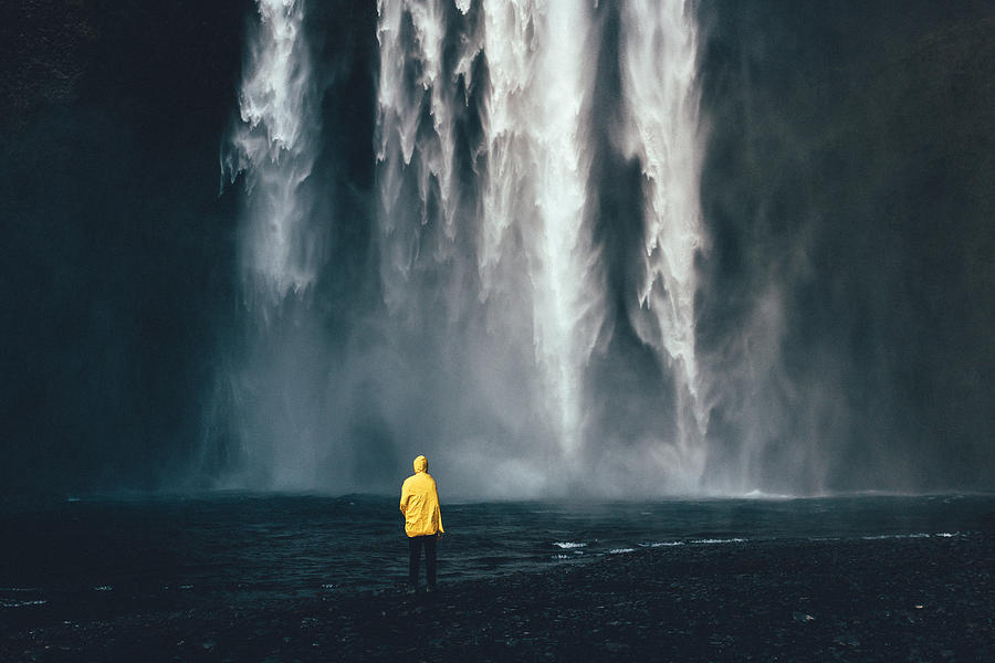 Man near the waterfall Photograph by Oleh_Slobodeniuk