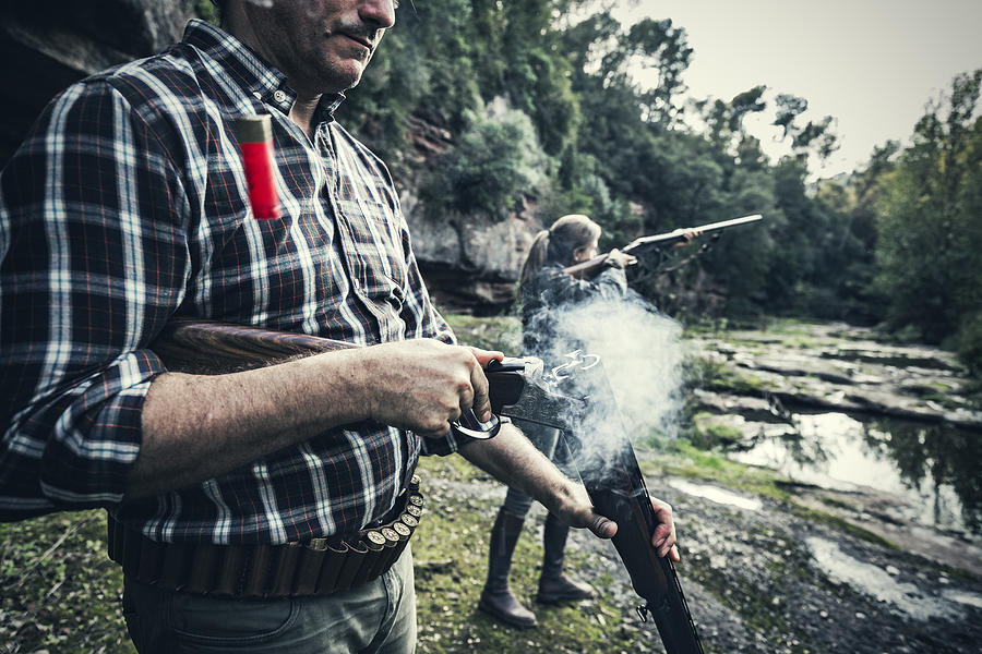Man opening gun Photograph by Aluxum