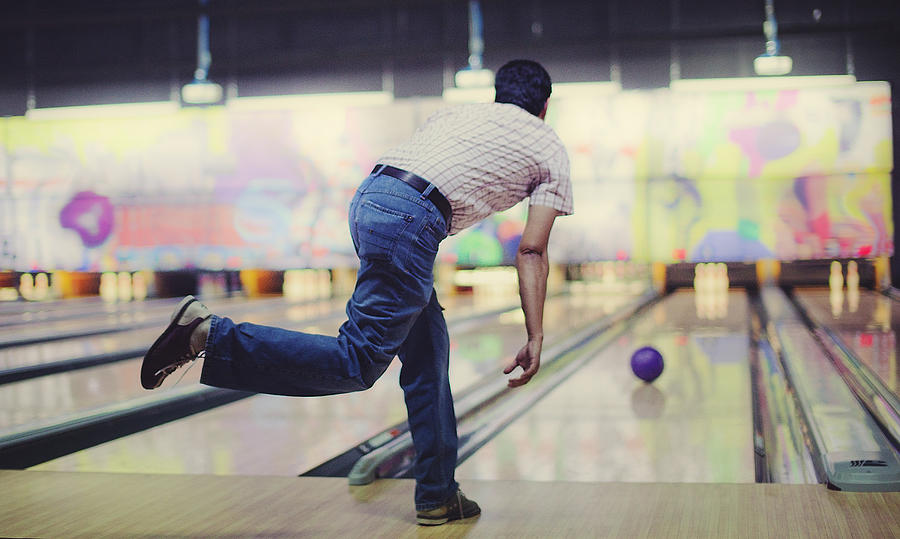 Man playing bowling Photograph by Daniel Stoychev Photography