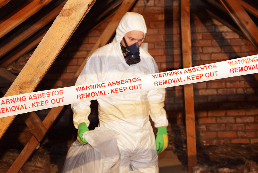 Man Removing Asbestos Photograph by Shank_ali