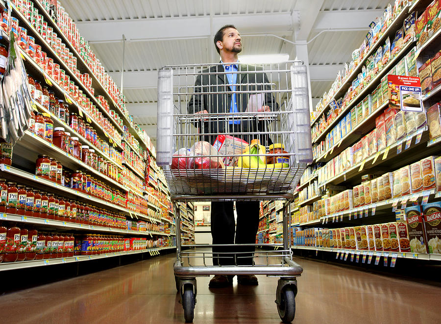 Man shopping for groceries. Photograph by Katrina Wittkamp