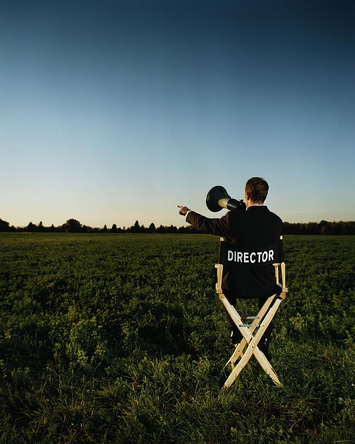 Man Sits Directing in Field Photograph by Silvia Otte