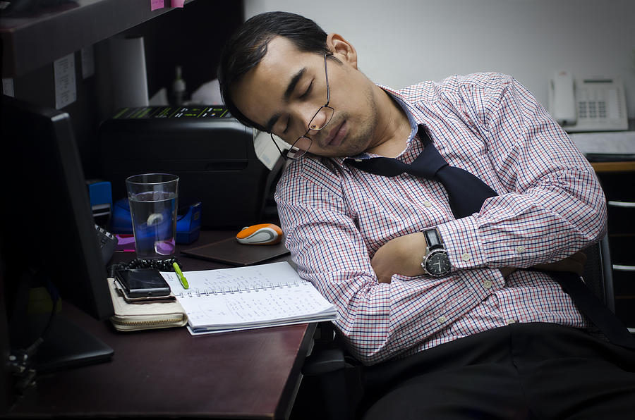 Man sleep on office Photograph by Yasser Chalid