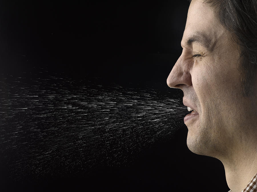Man Sneezing Photograph by Jeffrey Coolidge