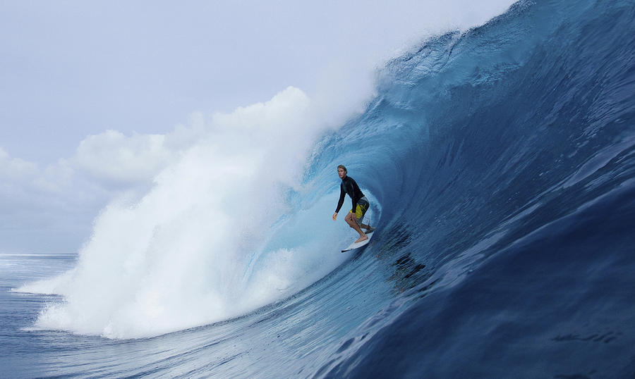 Man surfing in curl of wave Photograph by Image Source RF/Justin Lewis