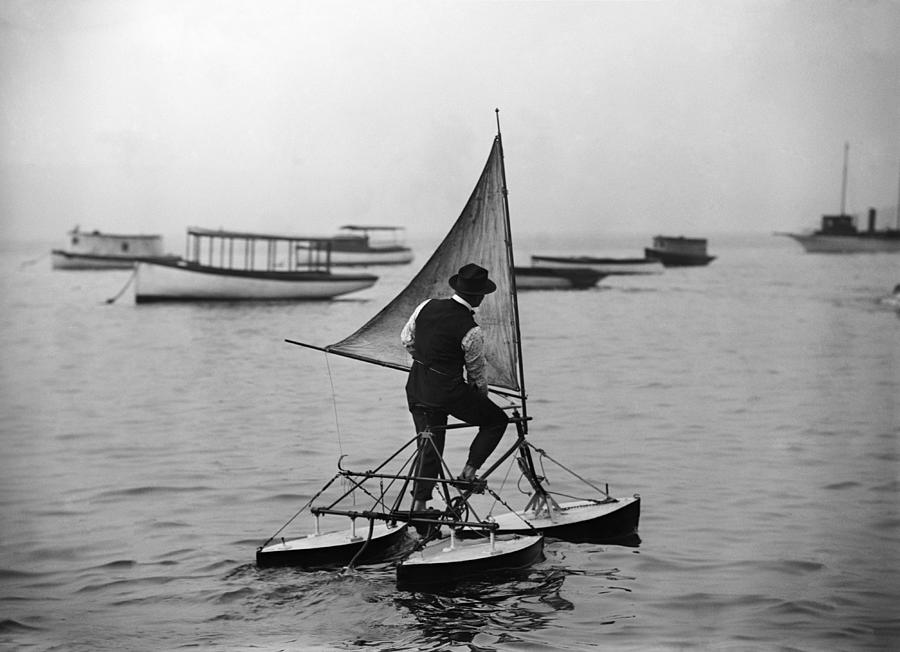 Man Testing A Water Tricycle - Circa 1900  Photograph by War Is Hell Store
