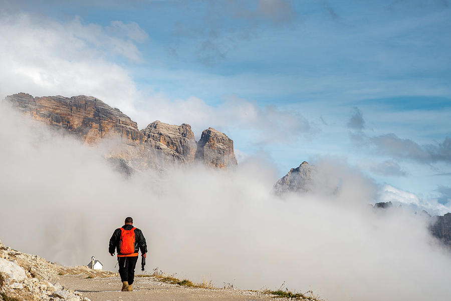 Man trekking at the hiking path at Tre Cime in South Tyrol in Italy. Photograph by Michalakis Ppalis