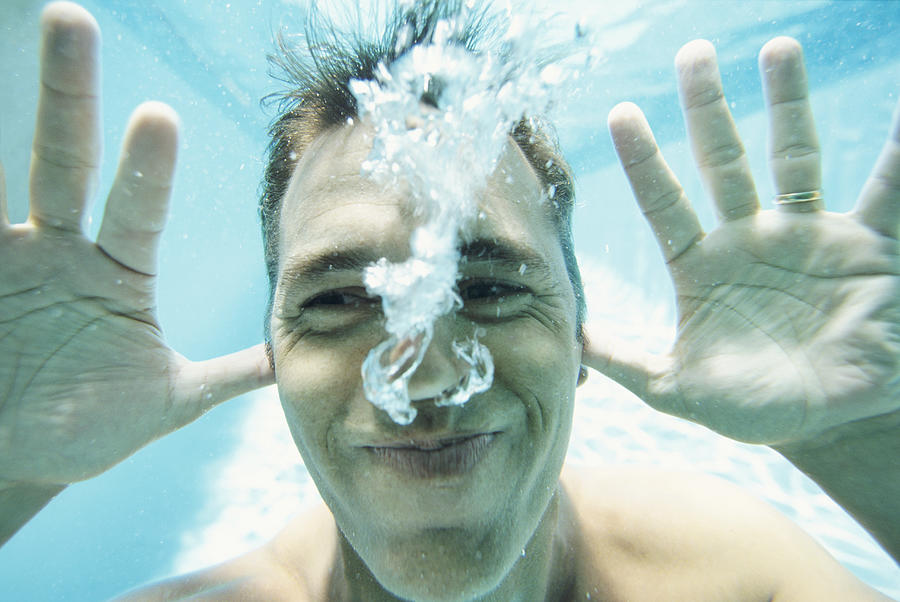 Man Underwater Pulling a Funny Face Photograph by B2M Productions
