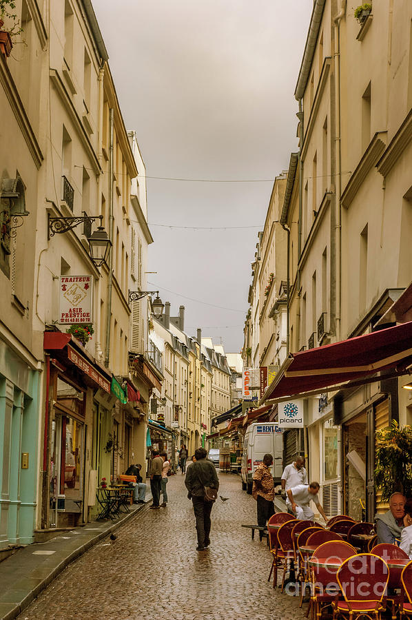 Paris Photograph - Man walks a Paris street by Micah May