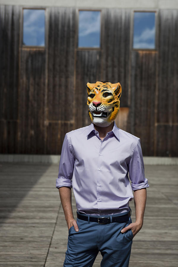 Man Wearing Tiger Mask Outdoor Photograph by Christine Schneider